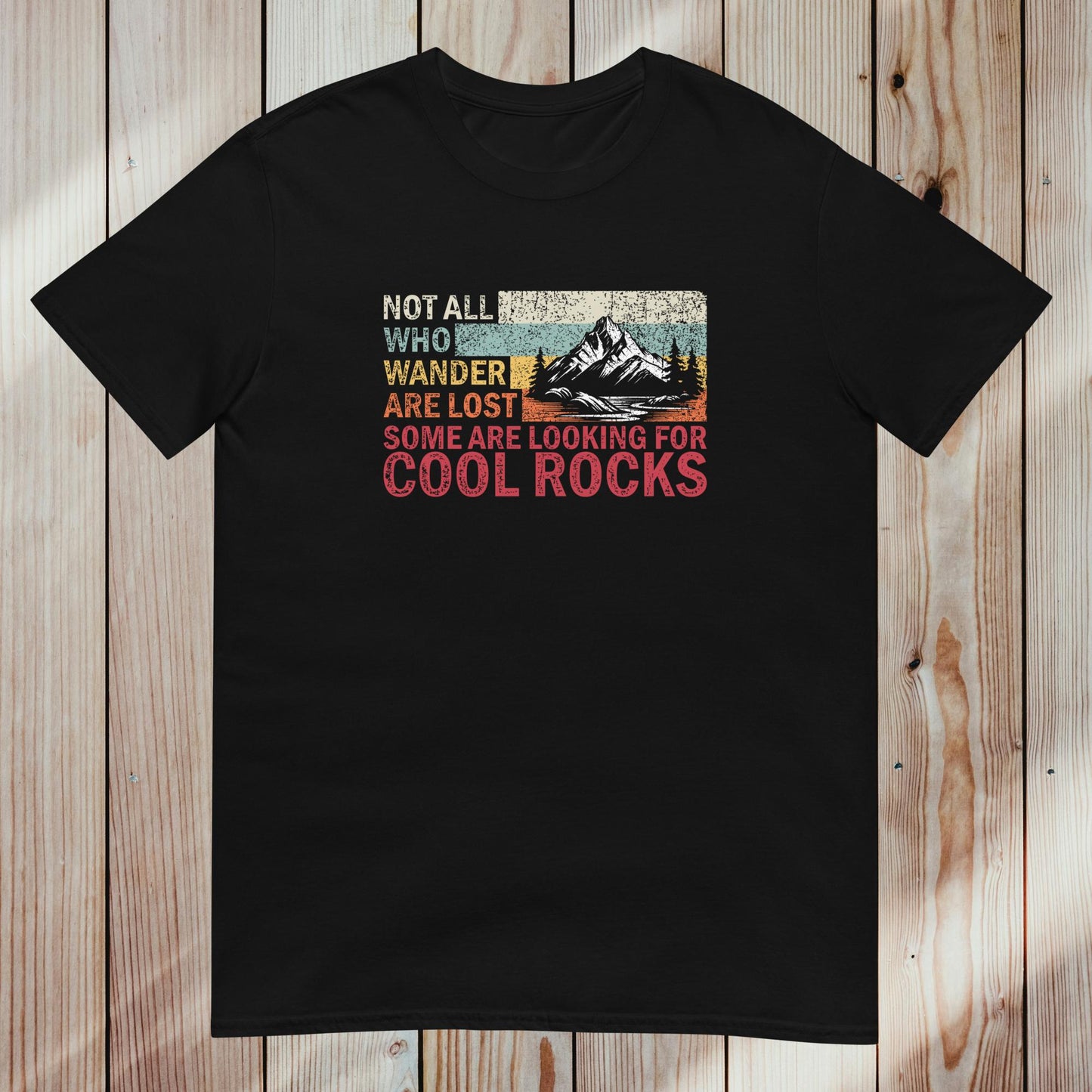 Unisex T-Shirt: "Not all who wander are lost, same are looking for cool rocks"